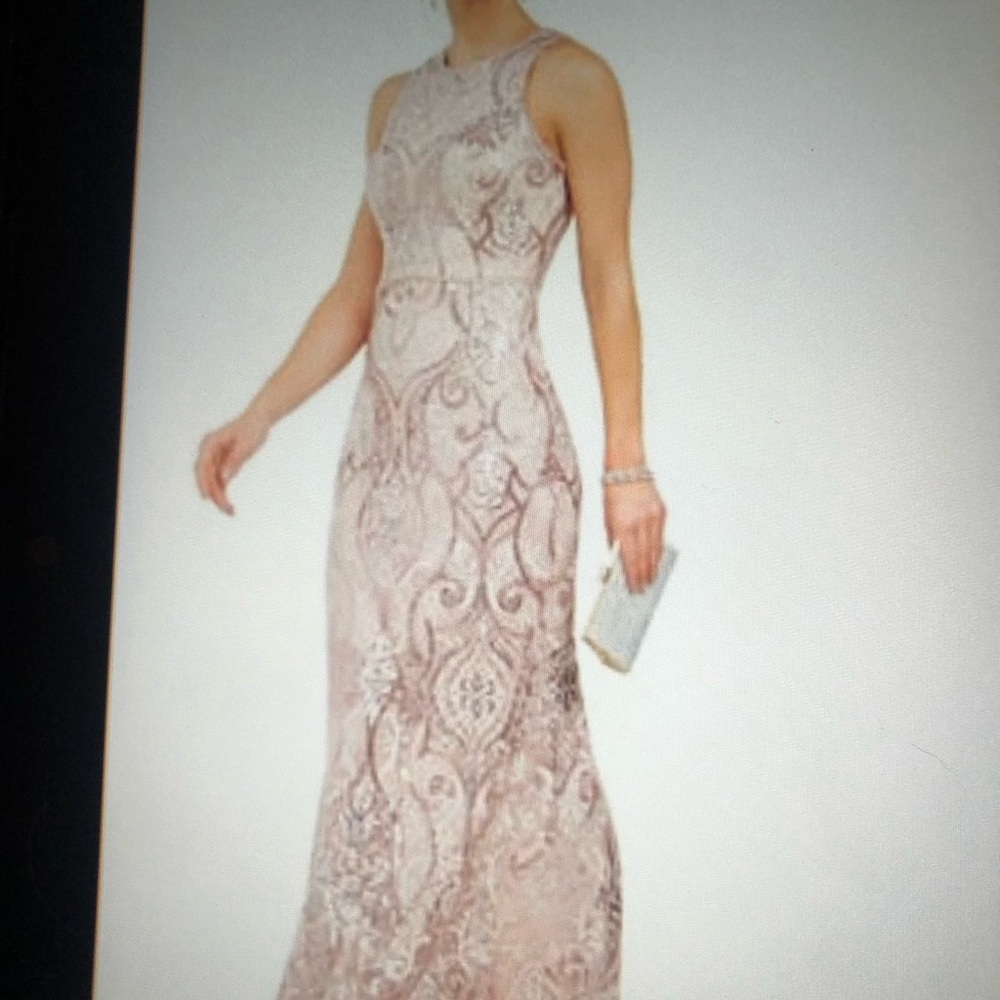 Beautiful mother of bride dress.  NWT went with the other option. Very pretty